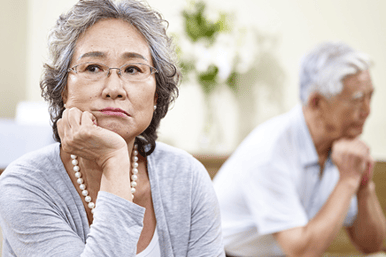 Caregiver sitting with loved one 